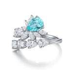 Lade Bild in die Galerieansicht, Pear Cut Lab Paraiba Crossover Engagement Ring - LGG Jewelry