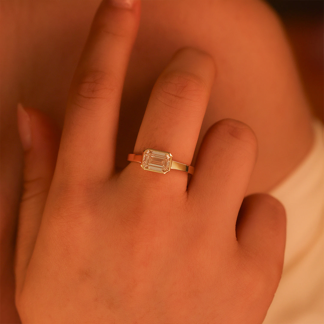 2 CT Emerald Cut Lab Diamond East- West Bezel Engagement Ring