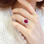 Load image into Gallery viewer, 1 Ct Oval Cut Lab Ruby Cluster Engagement Ring - LGG Jewelry
