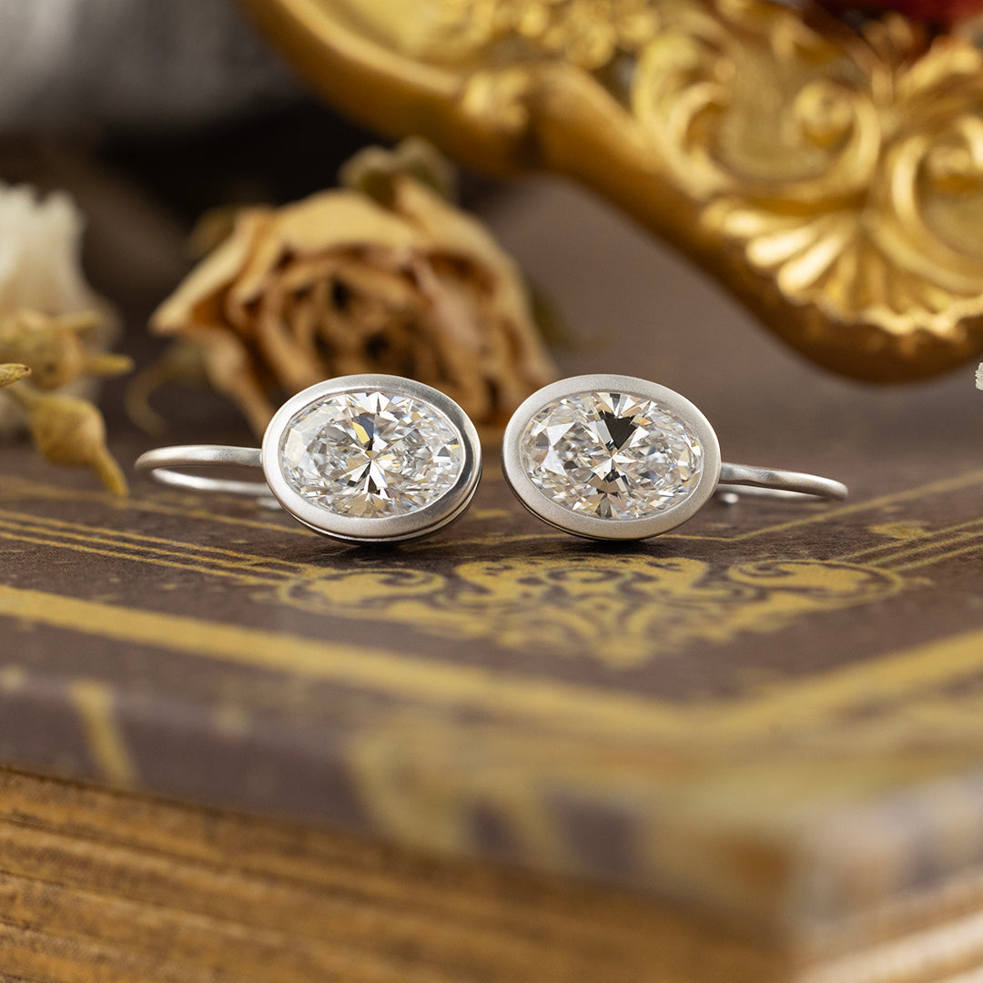Matte Bezel Oval Cut Lab Diamond Dangle Earrings with Lab Blue Sapphire Hidden Halo