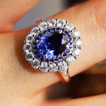 Lade Bild in die Galerieansicht, 2 Ct Oval Cut Lab Blue Sapphire Halo Engagement Ring - LGG Jewelry