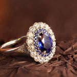 Lade Bild in die Galerieansicht, 2 Ct Oval Cut Lab Blue Sapphire Halo Engagement Ring - LGG Jewelry