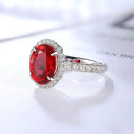 Load image into Gallery viewer, 2.5 Ct Oval Shape Lab Ruby Half Pave Halo Engagement Ring - LGG Jewelry
