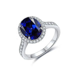 Lade Bild in die Galerieansicht, 2.5 Ct Oval Shape Lab Blue Sapphire Half Pave Halo Engagement Ring - LGG Jewelry