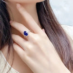 Lade Bild in die Galerieansicht, 2.5 Ct Oval Shape Lab Blue Sapphire Half Pave Halo Engagement Ring - LGG Jewelry