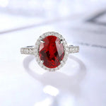 Lade Bild in die Galerieansicht, 2.5 Ct Oval Shape Lab Ruby Half Pave Halo Engagement Ring - LGG Jewelry