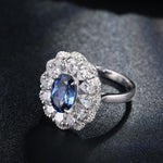 Lade Bild in die Galerieansicht, 2.6 Ct Oval Cut Lab Blue Sapphire Double Cluster Engagement Ring - LGG Jewelry