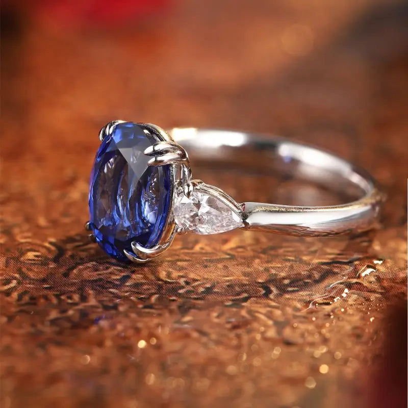 3.4 Ct Oval Cut Lab Blue Sapphire Three-Stone Engagement Ring - LGG Jewelry