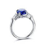 Lade Bild in die Galerieansicht, 3.4 Ct Oval Cut Lab Blue Sapphire Three-Stone Engagement Ring - LGG Jewelry
