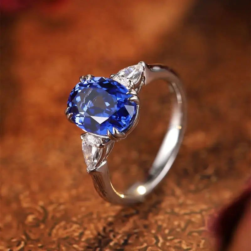 3.4 Ct Oval Cut Lab Blue Sapphire Three-Stone Engagement Ring - LGG Jewelry