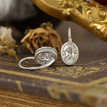 Load image into Gallery viewer, Matte Bezel Oval Cut Lab Diamond Dangle Earrings with Lab Blue Sapphire Hidden Halo
