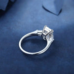 Load image into Gallery viewer, 3 Ct Emerald Cut Lab Diamond Three-Stone Engagement Ring with two Tapered Baguette - LGG Jewelry
