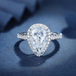 Load image into Gallery viewer, 3 Ct Pear Shape Lab Diamond Halo Half Pave Engagement Ring - LGG Jewelry
