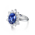 Lade Bild in die Galerieansicht, 4 Ct Oval Cut Lab Blue Sapphire Cluster Engagement Ring - LGG Jewelry