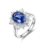 Lade Bild in die Galerieansicht, 4 Ct Oval Cut Lab Blue Sapphire Cluster Engagement Ring - LGG Jewelry