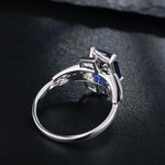 Lade Bild in die Galerieansicht, 4.4 Ct Emerald Cut Lab Blue Sapphire Engagement Ring - LGG Jewelry
