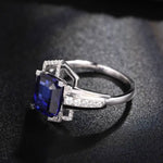 Lade Bild in die Galerieansicht, 4.4 Ct Emerald Cut Lab Blue Sapphire Engagement Ring - LGG Jewelry