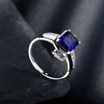 Lade Bild in die Galerieansicht, 4.4 Ct Emerald Cut Lab Blue Sapphire Engagement Ring - LGG Jewelry