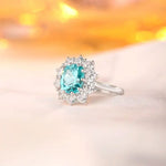 Lade Bild in die Galerieansicht, 4.5 Ct Cushion Shape Lab Paraiba Halo Engagement Ring - LGG Jewelry