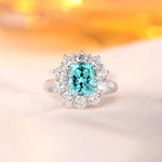 Lade Bild in die Galerieansicht, 4.5 Ct Cushion Shape Lab Paraiba Halo Engagement Ring - LGG Jewelry