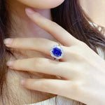 Lade Bild in die Galerieansicht, 5 Ct Cushion Cut Lab Blue Sapphire Halo Engagement Ring - LGG Jewelry