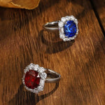 Lade Bild in die Galerieansicht, 5 Ct Cushion Cut Lab Blue Sapphire Halo Engagement Ring - LGG Jewelry
