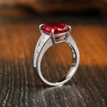Lade Bild in die Galerieansicht, 5.3 Ct Cushion Shape Lab Ruby Four Prongs Half Graduating Channel Engagement Ring - LGG Jewelry