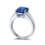 Lade Bild in die Galerieansicht, 5.5 Ct Cushion Shape Lab Blue Sapphire Four Prongs Half Graduating Channel Engagement Ring - LGG Jewelry
