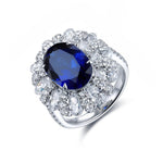 Lade Bild in die Galerieansicht, 6 Ct Oval Cut Lab Blue Sapphire Cluster Engagement Ring - LGG Jewelry