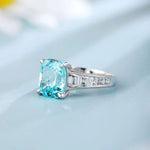 Lade Bild in die Galerieansicht, 6.5 Ct Cushion Shape Lab Paraiba Four Prongs Graduating Pave Engagement Ring - LGG Jewelry
