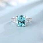 Lade Bild in die Galerieansicht, 6.5 Ct Cushion Shape Lab Paraiba Four Prongs Graduating Pave Engagement Ring - LGG Jewelry