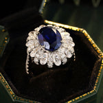 Load image into Gallery viewer, 6 Ct Oval Cut Lab Blue Sapphire Cluster Engagement Ring - LGG Jewelry
