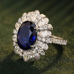 Load image into Gallery viewer, 6 Ct Oval Cut Lab Blue Sapphire Cluster Engagement Ring - LGG Jewelry
