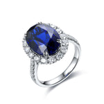 Load image into Gallery viewer, 8.5 Ct Oval Cut Lab Blue Sapphire Halo Engagement Ring - LGG Jewelry
