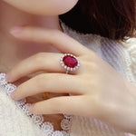 Lade Bild in die Galerieansicht, 8.5 Ct Oval Cut Lab Ruby Halo Engagement Ring - LGG Jewelry