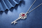 Load image into Gallery viewer, Pear Cut Lab Ruby Pave Key Pendant Necklace - LGG Jewelry
