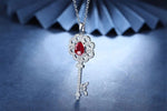 Load image into Gallery viewer, Pear Cut Lab Ruby Pave Key Pendant Necklace - LGG Jewelry
