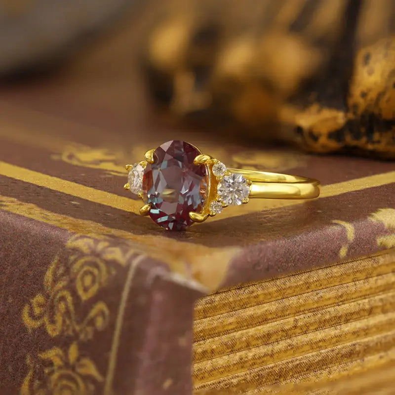 Discoloring Oval Cut Lab Alexandrite Three Stone Engagement Ring - LGG Jewelry