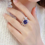 Lade Bild in die Galerieansicht, Floral Blossom 4.5 Ct Oval Lab Blue Sapphire Engagement Ring - LGG Jewelry