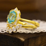 Lade Bild in die Galerieansicht, Floral Cluster 2 Ct Oval Lab Paraiba Bridal Ring Set - 2pcs - LGG Jewelry
