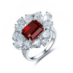 Lade Bild in die Galerieansicht, Flower Cluster 4 Ct Emerald Cut Lab Ruby Engagement Ring - LGG Jewelry