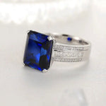 Lade Bild in die Galerieansicht, Luxury Triple Split Shank 13 Ct Emerald Cut Lab Blue Sapphire Engagement Ring - LGG Jewelry