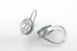 Lade Bild in die Galerieansicht, Matte Bezel Oval Cut Lab Diamond Dangle Earrings with Lab Blue Sapphire Hidden Halo - LGG Jewelry