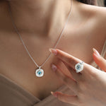 Lade Bild in die Galerieansicht, Oval Blue Topaz with Nacre Cluster Cocktail Ring - LGG Jewelry