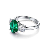Lade Bild in die Galerieansicht, Oval Cut Lab Emerald Three-Stone Engagement Ring - LGG Jewelry