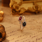 Lade Bild in die Galerieansicht, Pear Cut Blue Topaz &amp; Garnet Toi Et Moi Ring - LGG Jewelry