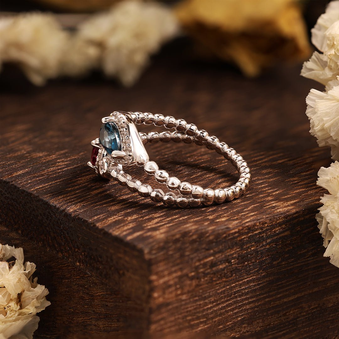Pear Cut Blue Topaz & Garnet Toi Et Moi Ring - LGG Jewelry