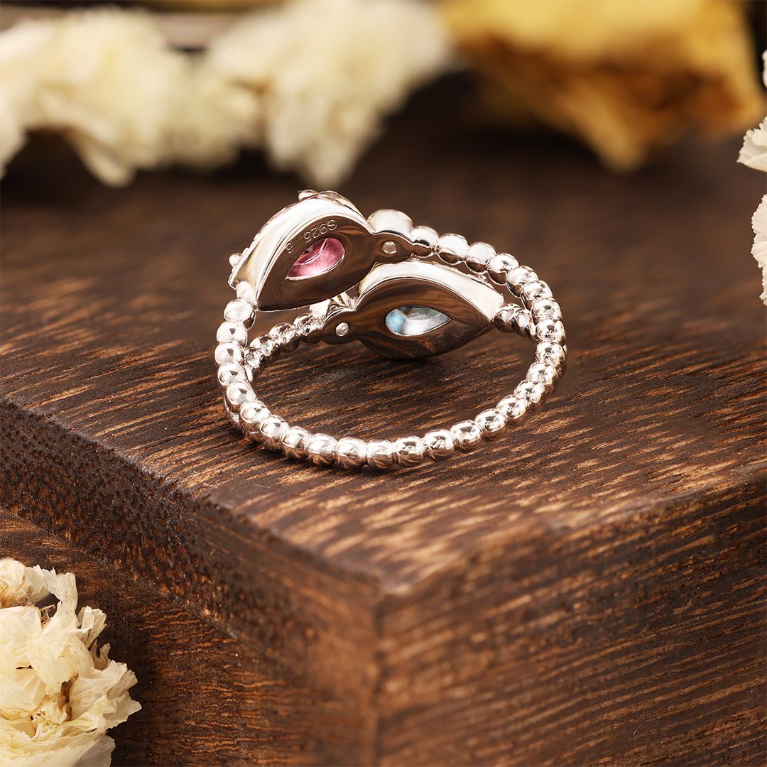 Pear Cut Blue Topaz & Garnet Toi Et Moi Ring - LGG Jewelry