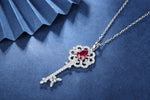 Lade Bild in die Galerieansicht, Pear Cut Lab Ruby Pave Key Pendant Necklace - LGG Jewelry