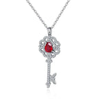 Lade Bild in die Galerieansicht, Pear Cut Lab Ruby Pave Key Pendant Necklace - LGG Jewelry